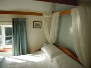 Bedroom with four poster bed