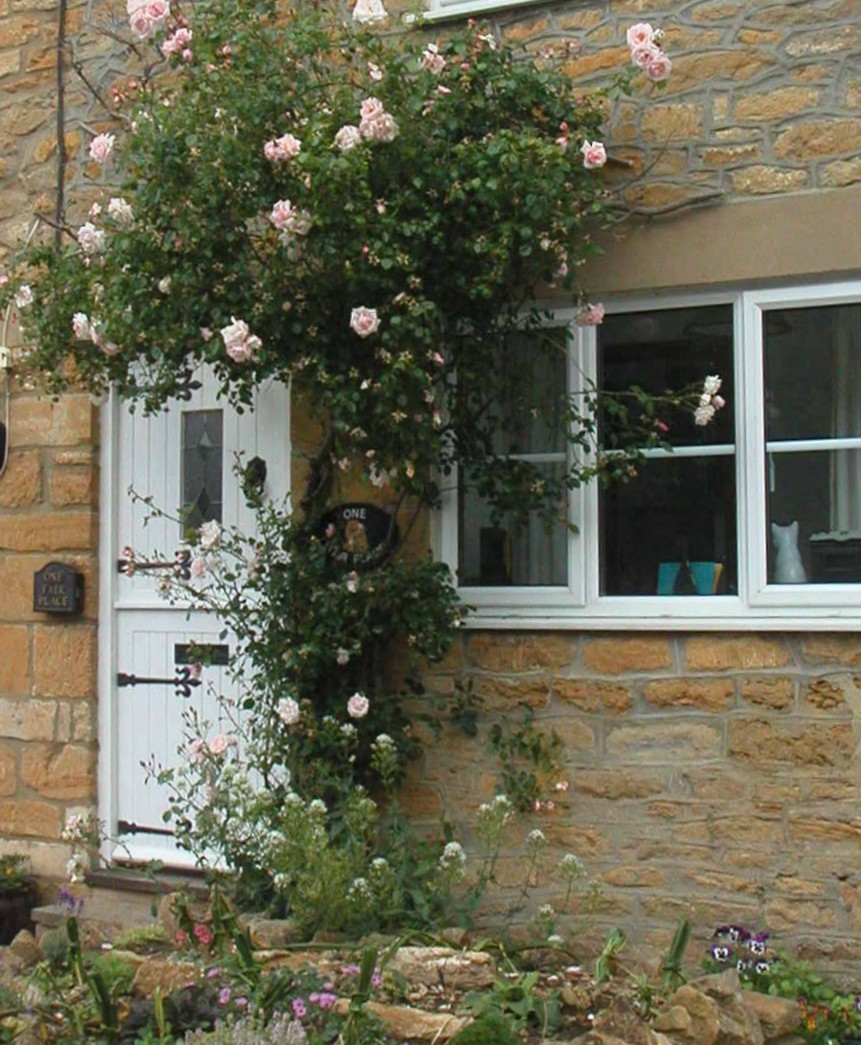 One Fair Place front door with roses
